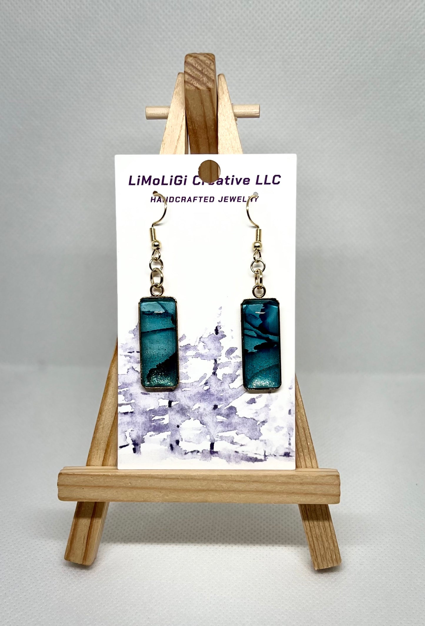 E25-040 Alcohol Ink Blue and Gold in Rectangle with glass cabochon