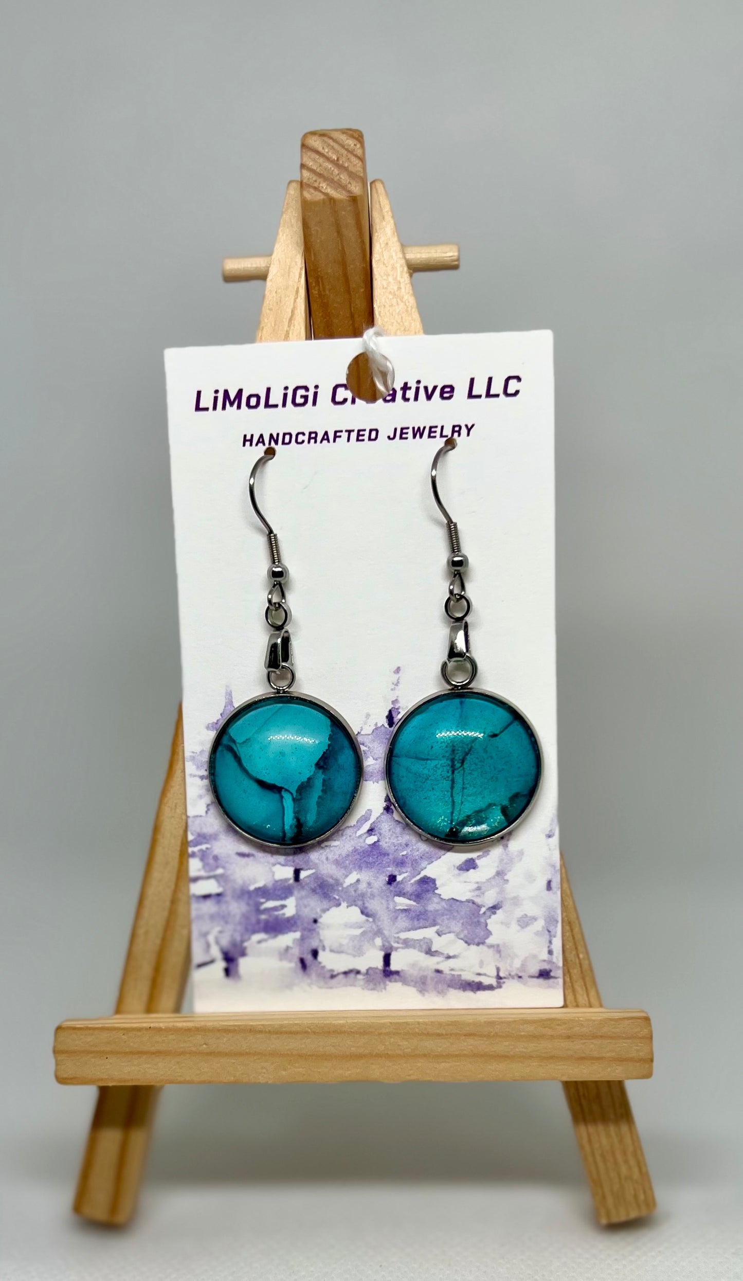 E25-041 Glacier I - Alcohol Ink in Round Stainless Steel with glass cabochon