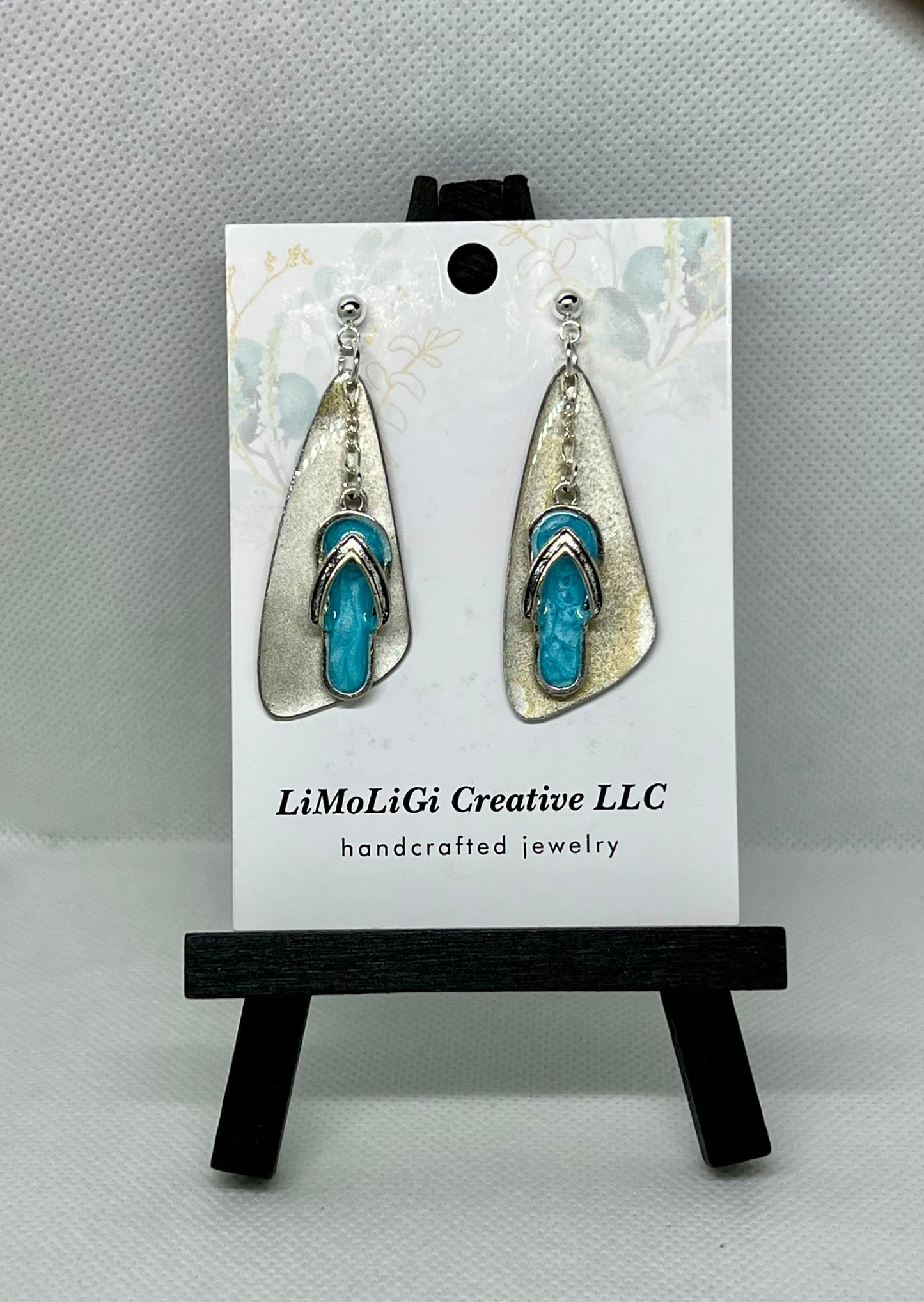 E25-076 Blue Flip Flops on Silver Elongated Triangle