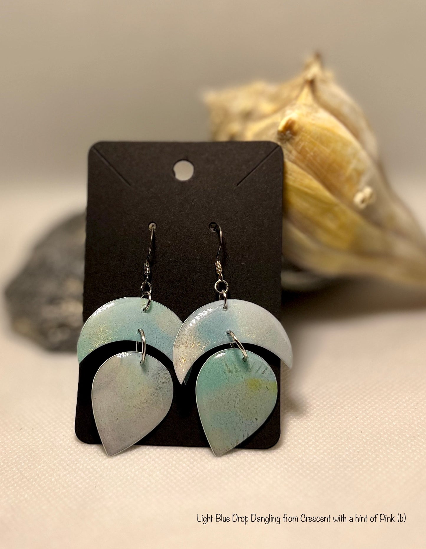 E5-Light Blue Dangling Drop from Crescent with Hint Of Pink