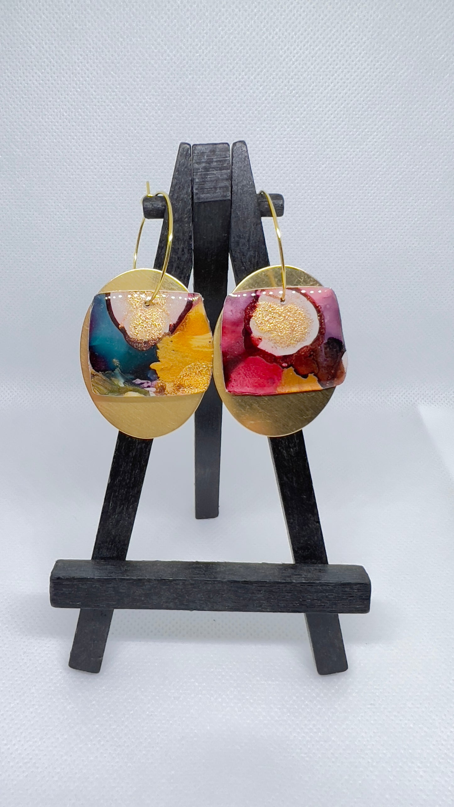 Multi-colored “Chunky” small on brass oval