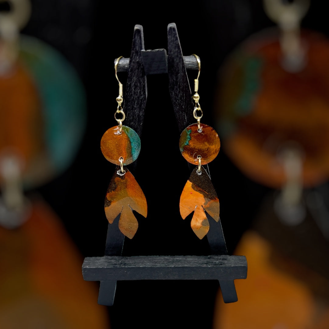 E25-011 Arrowhead with Circle in Charcoal Burnt Orange and Teal