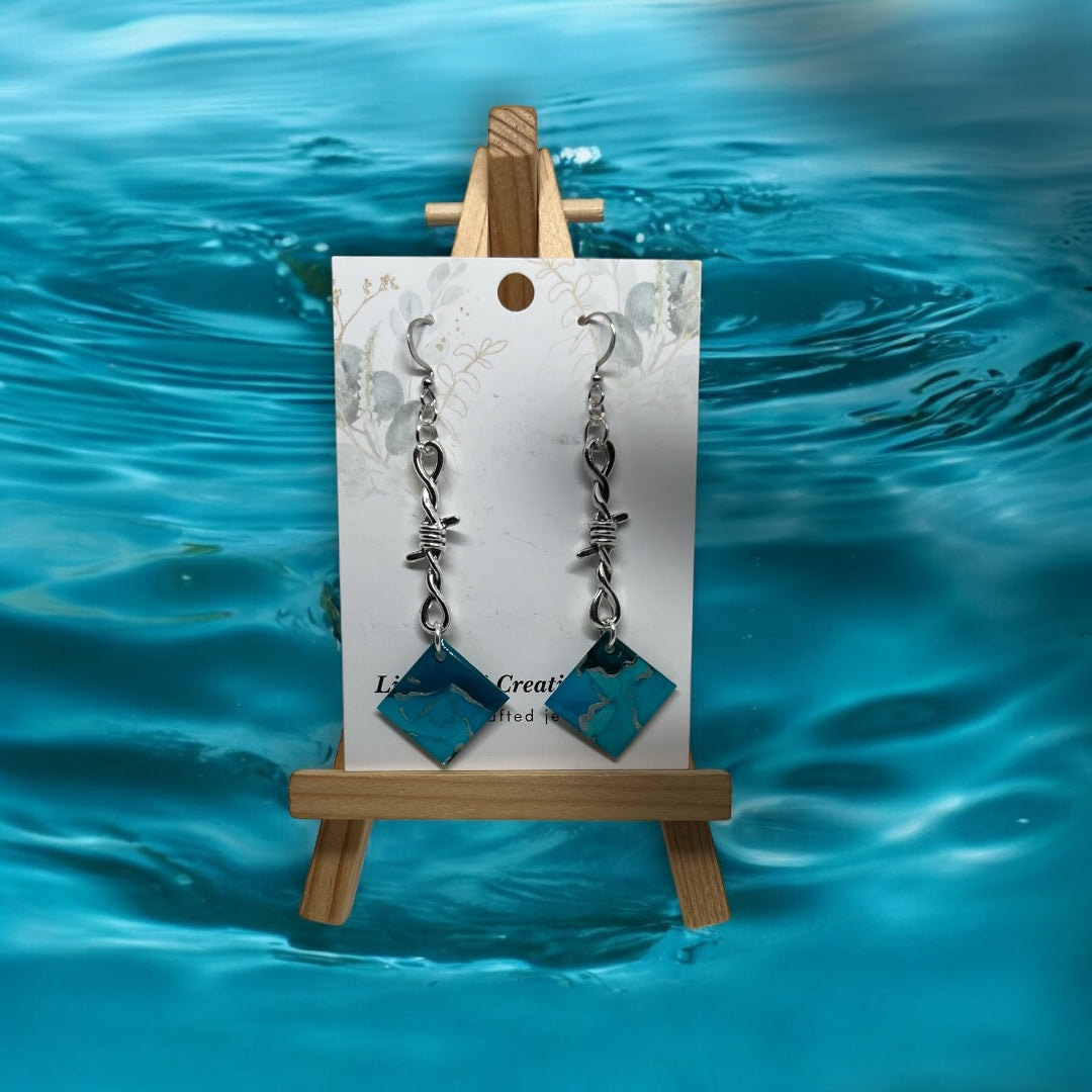 E25-057 Pool Splash Blue with Silver Diamonds with Silver Twisted attachment